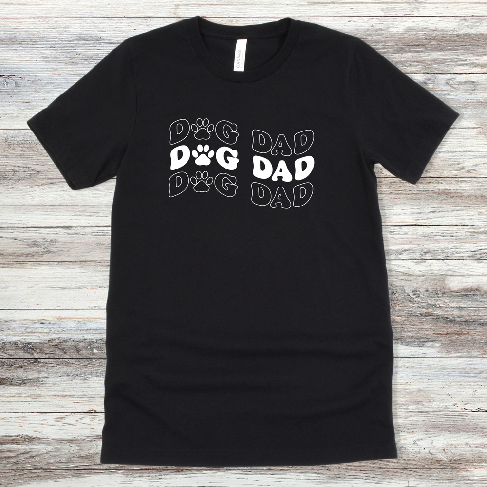 
                      
                        Text reading "Dog Dad" on a Black Tee
                      
                    