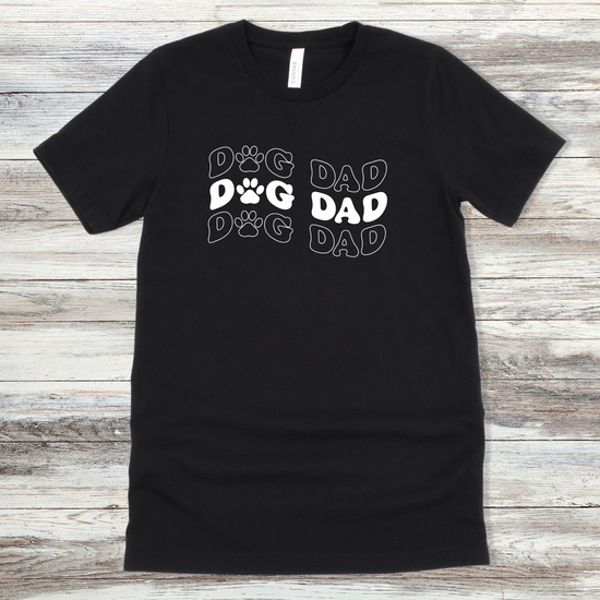 Text reading "Dog Dad" on a Black Tee