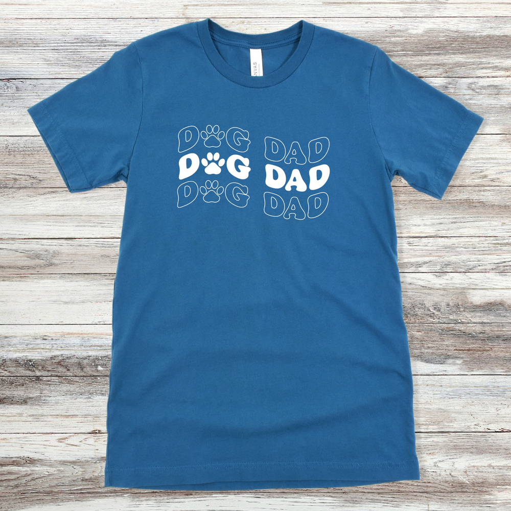 
                      
                        Text reading "Dog Dad" on a Deep Teal Tee
                      
                    