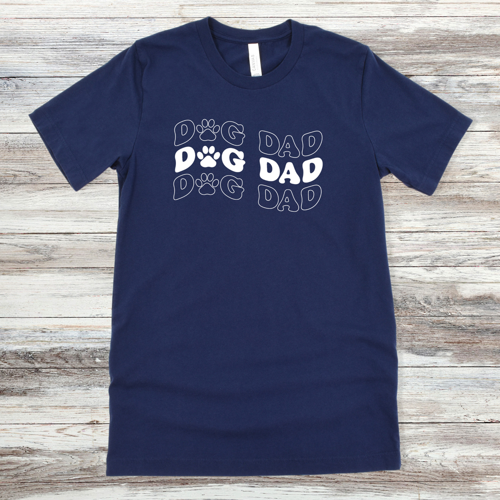 
                      
                        Text reading "Dog Dad" on a Navy Tee
                      
                    